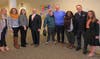 Liberty Bay Credit Union employees pose with Road To Responsibility Staff and Clients During Recent Tour